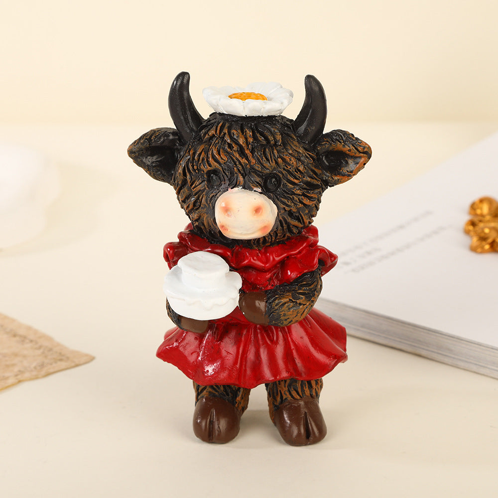 Desktop ornaments featuring a pair of cows as decorative items